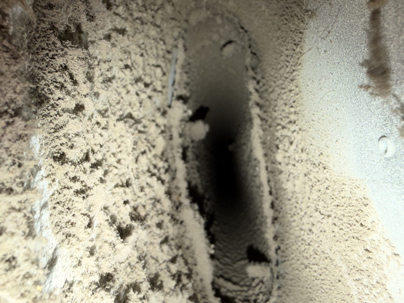 Heavy dust inside a duct before AMG cleaning
