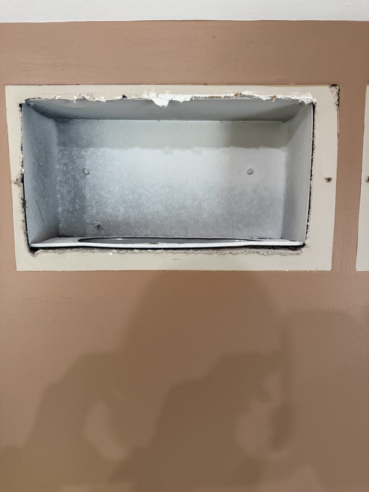 A cleaned vent housing after AMG service