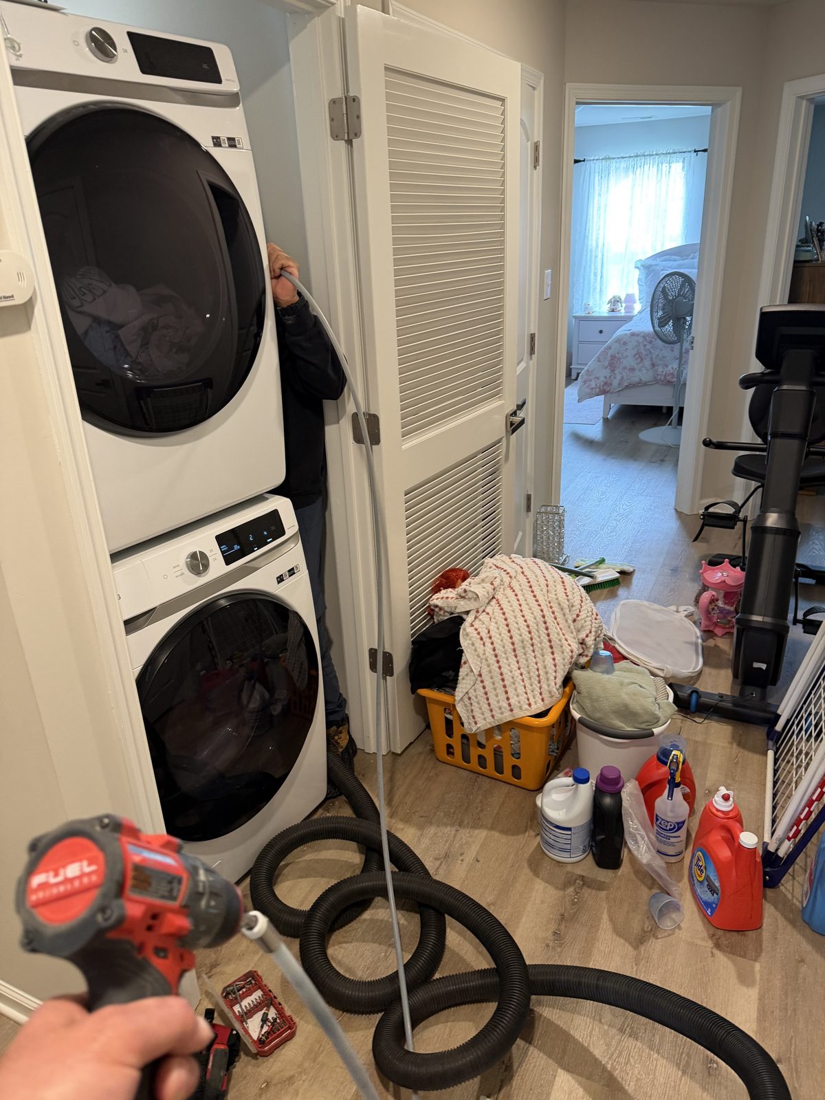 A laundry room dryer vent serviced by AMG