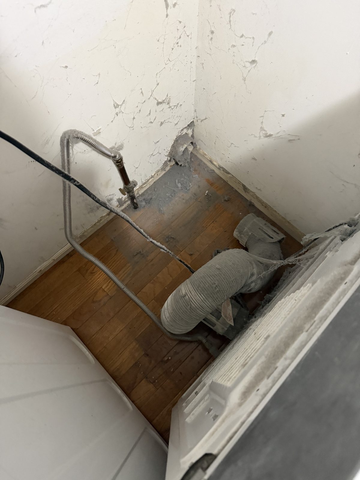 A dryer vent line serviced by AMG